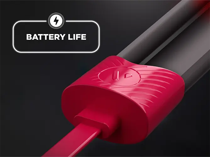 Vuse vape device and charging cord on black background