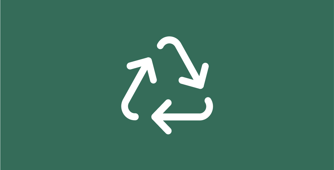 L'icône du recyclage en blanc sur fond vert