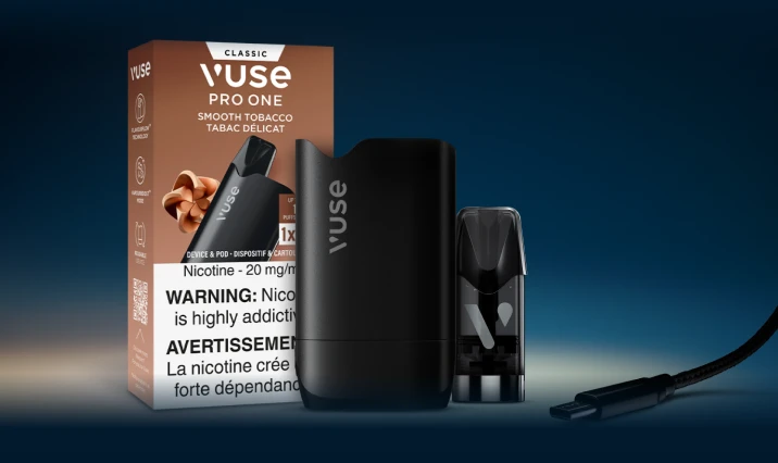 Vuse Pro One ready to vape kit in smooth tobacco with the usb charging cable against a navy gradient background